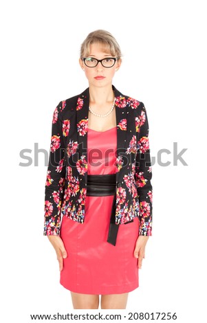 Beautiful businesswoman doing different expressions in different sets of clothes: at attention
