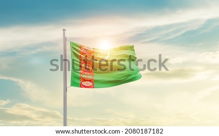 Tuvalu national flag waving in beautiful sky.