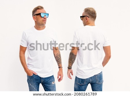 Man wearing blank white t-shirt, front and back view, mockup for t shirt design