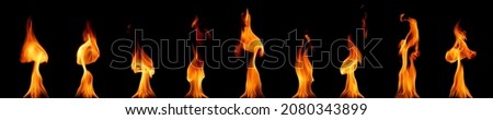 set pile of abstract heat energy flames red, orange and yellow Burning fuel at night, very hot, isolated on a black background.