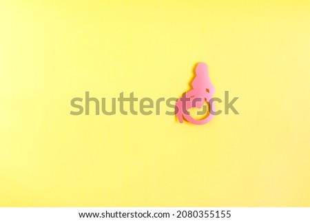 Minimalistic picture of a man in a medical chair. Abstract painting of a person with disabilities