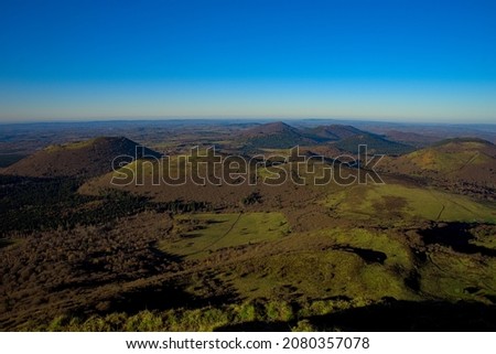 view of the Chaine des Volcans d'Auvergne in Puy-de-Dome in autumn Royalty-Free Stock Photo #2080357078