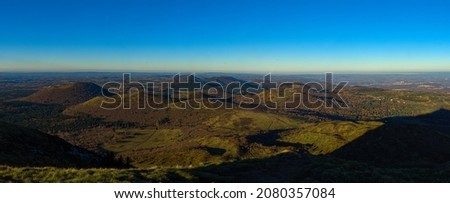 panoramic view of the Auvergne volcanic chain in Puy-de-Dome in autumn Royalty-Free Stock Photo #2080357084