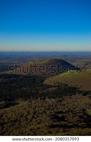 view of the Chaine des Volcans d'Auvergne in Puy-de-Dome in autumn Royalty-Free Stock Photo #2080357093