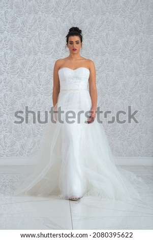Girl with wedding dress posing for photo shoot, dresses and fashion on location