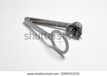 Egg cutter isolated on white background.High-resolution photo.