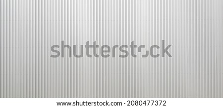 Texture of a corrugated sheet metal aluminum facade Royalty-Free Stock Photo #2080477372