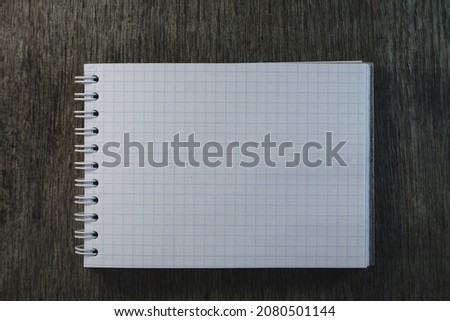Blank notepad close up photo