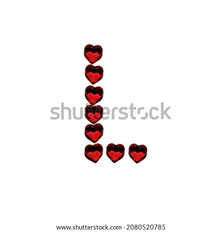 alphabet letters from red plastic decorative hearts for the inscription I love you isolated on white background