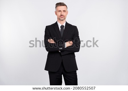 Photo of confident handsome young manager wear black jacket arms crossed isolated grey color background