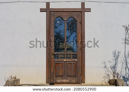 Entrance door. Old architecture in the village. Building or house. Background
