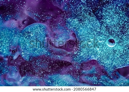 Abstract purple liquid background, paint splash, swirl pattern and water drops, beauty gel and cosmetic texture, contemporary magic art and science as luxury flatlay design. Royalty-Free Stock Photo #2080566847