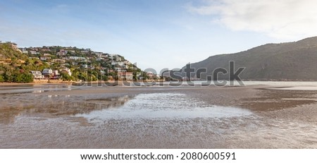The Knysna Lagoon in South Africa's Garden Route, with the Knysna Heads in the centre and the Featherbed Nature Reserve on the right. Royalty-Free Stock Photo #2080600591