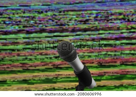 microphone on glitch technology background