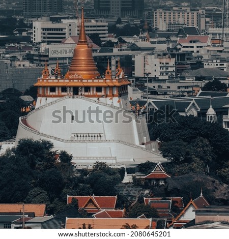 Wat Saket (Phu Khao Thong) is a Buddhist temple (wat) in Pom Prap Sattru Phai district, Bangkok, Thailand. Royalty-Free Stock Photo #2080645201