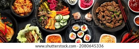 Assortment of Korean traditional dishes. Asian food. Top view, flat lay, panorama Royalty-Free Stock Photo #2080645336