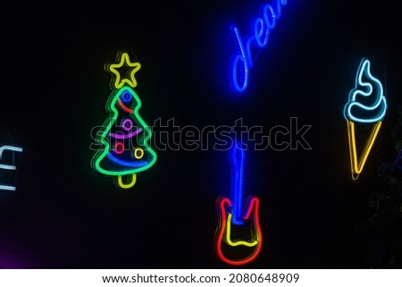 neon signs on the wall in the New Year's interior 