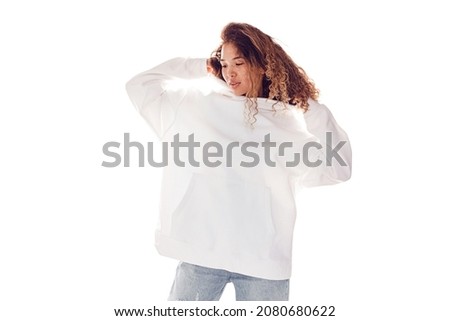 Woman with thick curly hair in white hoodie isolated on white background. Mock-up.