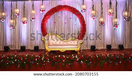 stage decoration with flowers an Indian traditional wedding setup Royalty-Free Stock Photo #2080703155