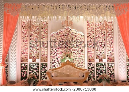 stage decoration with flowers an Indian traditional wedding setup Royalty-Free Stock Photo #2080713088
