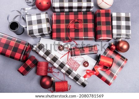 Wrapped gifts for Christmas with wrapping paper with a checkered pattern