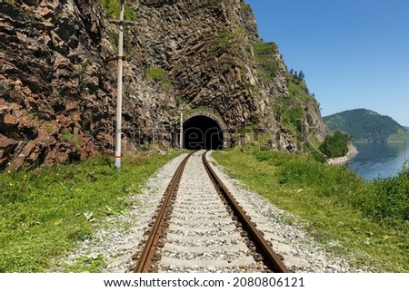 Circum-Baikal Railway. Old railroad tunnel number 34 on the railway. tunnel Khabartuy  Royalty-Free Stock Photo #2080806121