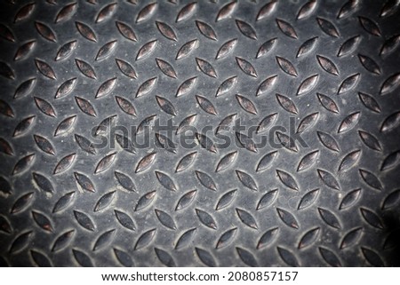 Grunge metal diamond plate background or texture