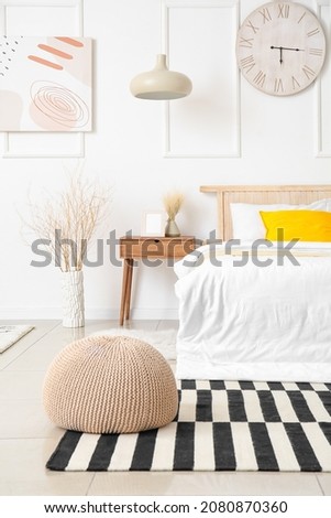 Interior of modern bedroom with carpet