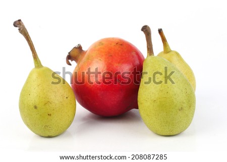 Pears and pomegranates isolated on white background