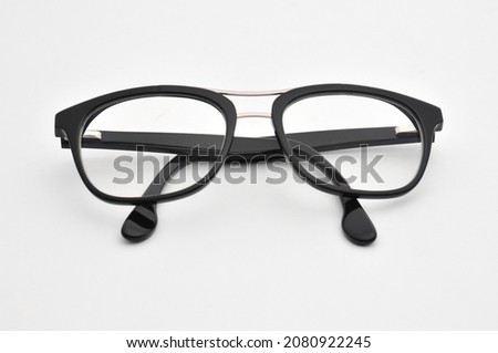 Transparent optical glasses  on an isolated white background.

 Royalty-Free Stock Photo #2080922245