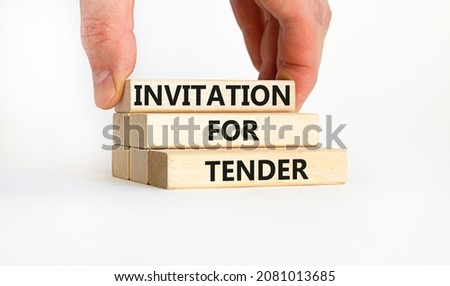 Invitation for tender symbol. Concept words 'Invitation for tender'. Businessman hand. Beautiful white background. Business and invitation for tender concept, copy space.