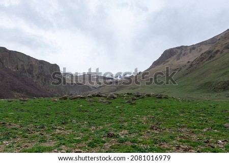 picturesque view of the mountains of the North Caucasus, photo taken on a cloudy spring day