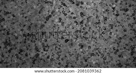 Elegant grey concrete or cement background with faints and flowers pattern on the wall, rough floral grunge antique textured stone wallpaper	