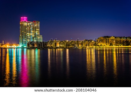 Waterfront condominiums at the Inner Harbor at night, seen from Harbor East, Baltimore, Maryland.