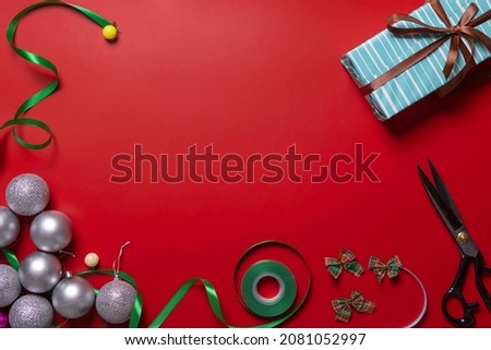 red christmas background with decoration and assorted gifts