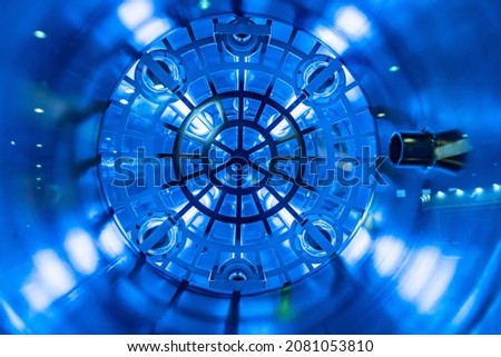 Fragment of installation for sterilization of water. Ultra violet sterilization equipment. Device for water purification from impurities and microbes. Installation disinfection using ultraviolet. Royalty-Free Stock Photo #2081053810