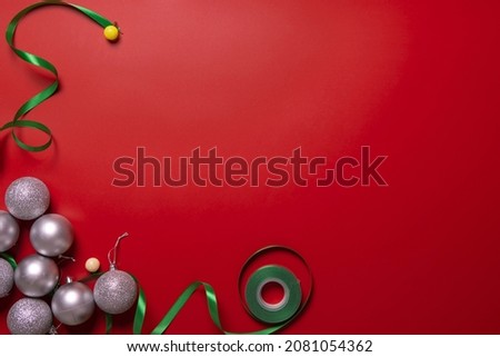 red christmas background with decoration and assorted gifts