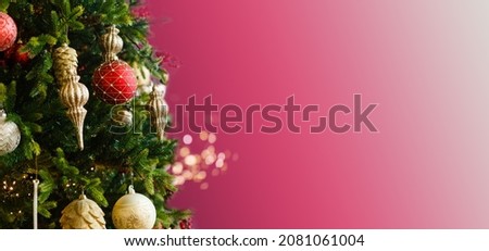 Decorated Christmas tree closeup, balls, garland