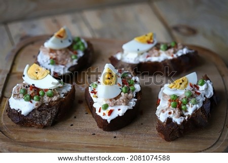 Selective focus. Toast with tuna and egg. Healthy toast. The keto diet.