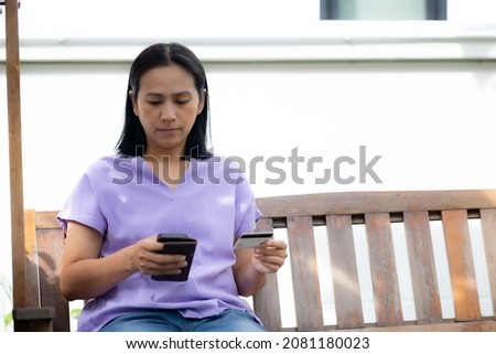 Asia women using credit card shopping