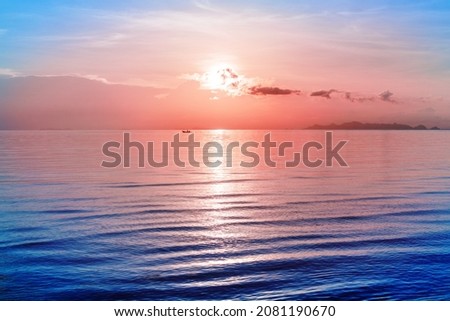 Beautiful sea sunset, morning ocean sunrise, tropical island beach, soft pink red sky clouds, sun glow reflection, blue water waves, boat silhouette, dawn landscape, summer holidays, vacation, travel