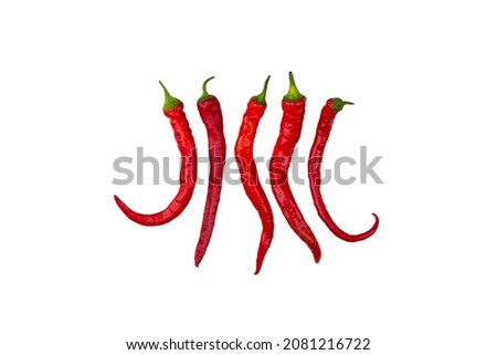 five large red hot chili peppers isolated on a white background