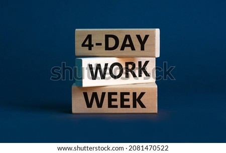 4-day work week symbol. Concept words '4-day work week' on wooden blocks. Beautiful grey background. Copy space. Business and 4-day work week concept. Royalty-Free Stock Photo #2081470522