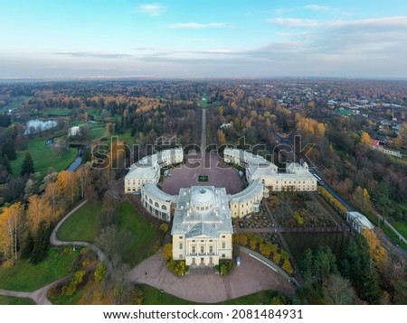 Panoramic aerial view of the Pavlovsk Park and the Pavlovsk Palace on an autumn evening.Bright autumn landscape, Slavyanka river. A suburb of St. Petersburg
