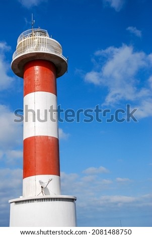 lighthouse on background of blue sky, beautiful photo digital picture