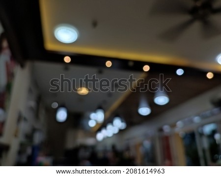 Defocused background of the lamps at the restaurant