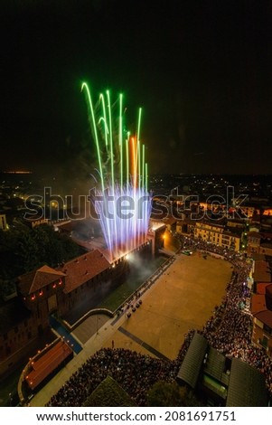 Fireworks at the castle seen from the bell tower of the parish church, Galliate, Novara, Piedmont, Italy
