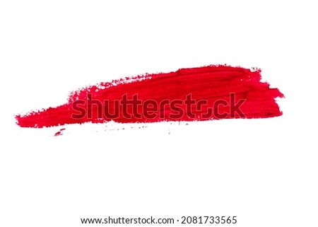 Lipstick smear smudge swatch isolated on white background. Lipstick, makeup product swatch. Cream makeup texture. Bright red color cosmetic product brush stroke swipe sample. Advertisement banner Royalty-Free Stock Photo #2081733565