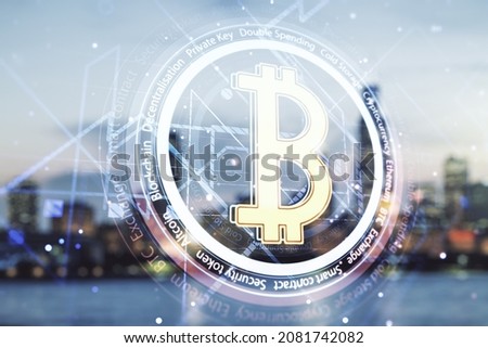 Double exposure of creative Bitcoin symbol hologram on blurry cityscape background. Cryptocurrency concept