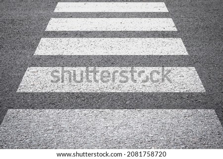 zebra crossing background on asphalt road